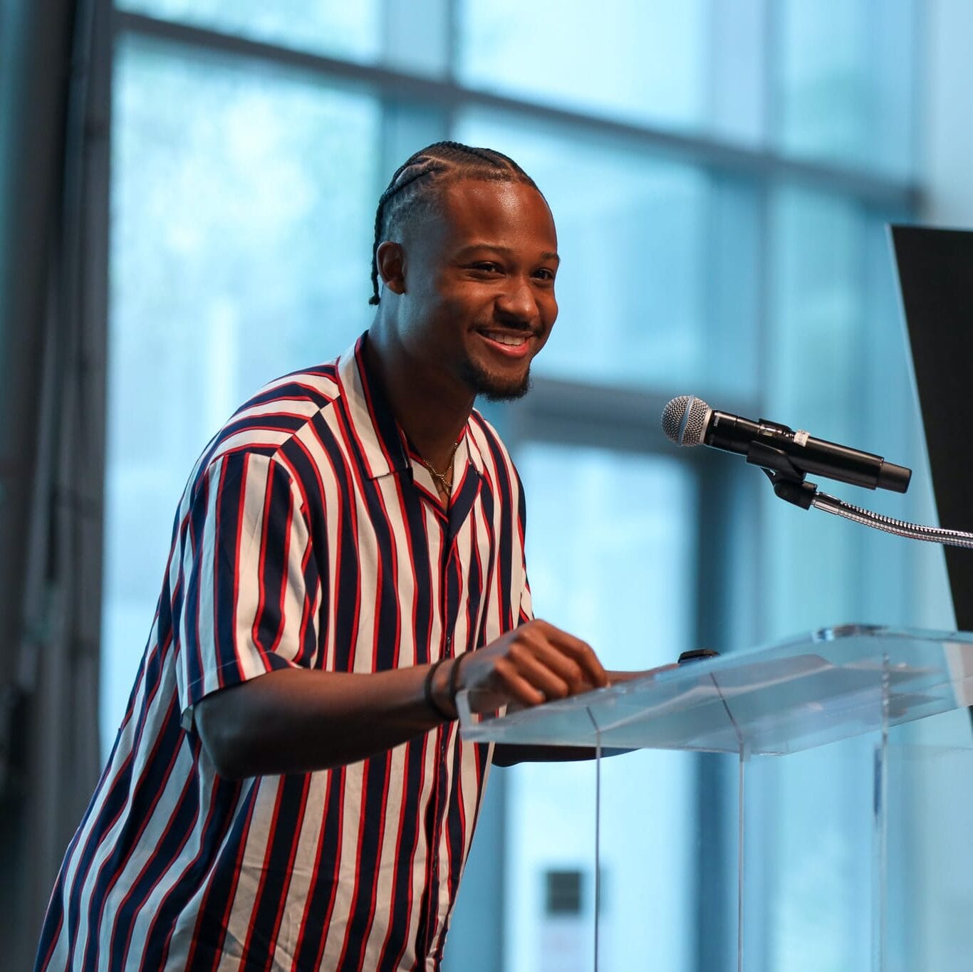 A man giving a speech, an example of what UofL Health community news we may share on our e-newsletter.